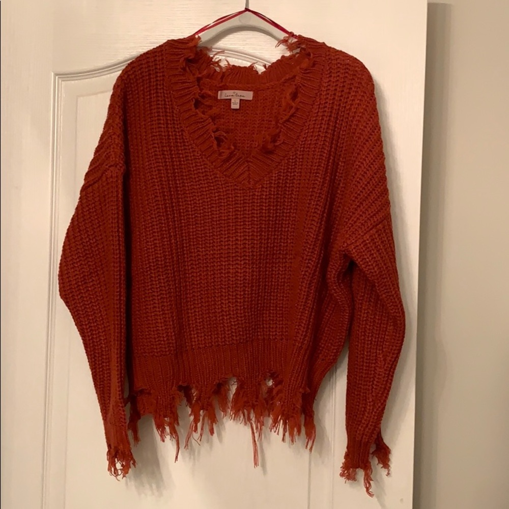 Distressed sweater